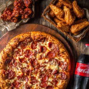 # 6 - 16â€ Pizza â€¢ 1 topping + 20 Wings  â€¢ One 2LT Soda