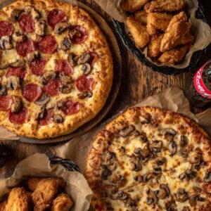 # 14 - 2 x 18â€ Pizza  â€¢ 2 toppings + 40 Wings  â€¢ Two 2LT Soda