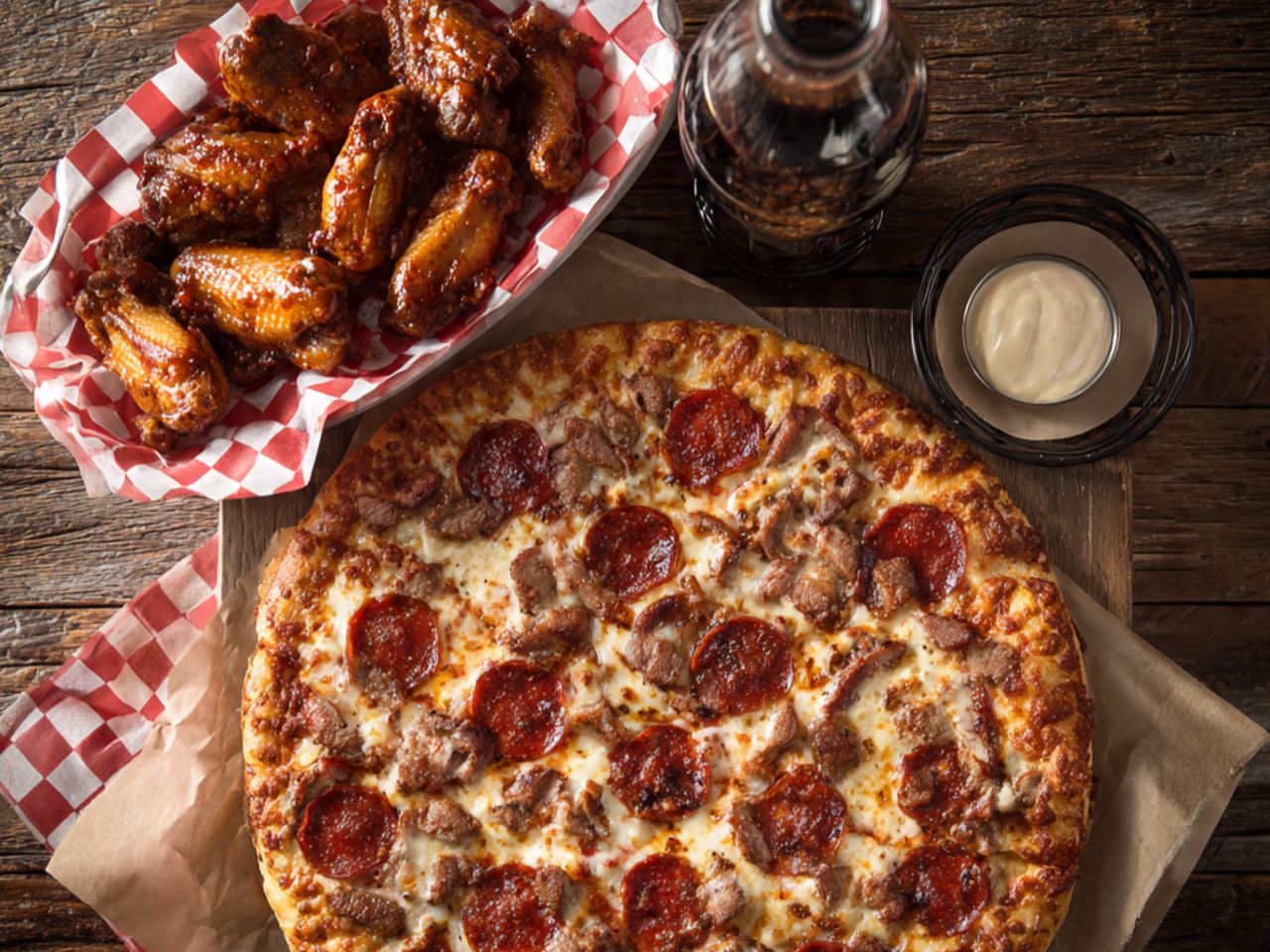# 8 - 30â€ Pizza â€¢ 2 topping + 20 Wings  â€¢ One 2LT Soda