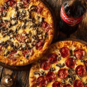# 4 - 2 x 16â€ Pizza  â€¢ 2 toppings  â€¢ One 2LT Soda