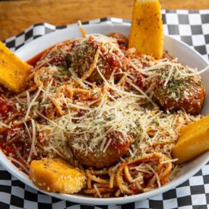 Spaghetti and meatballs with garlic bread