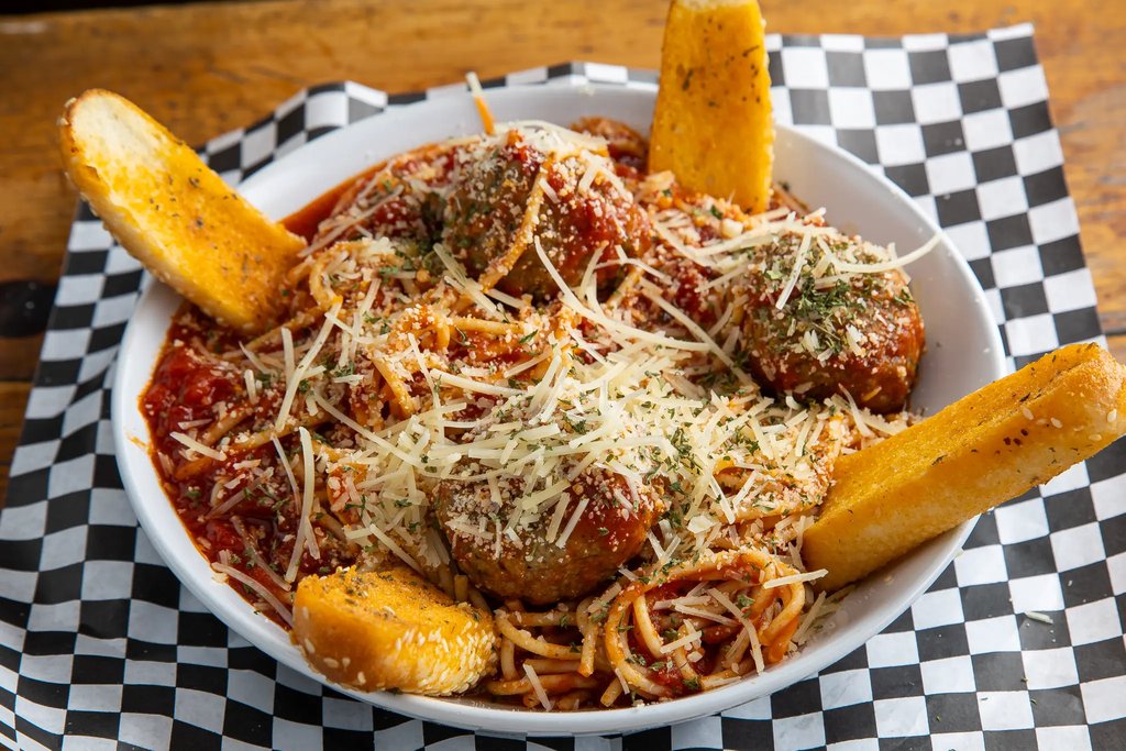 # 8 - Spaghetti & Meatballs w / Garlic Bread  • Free Can Soda